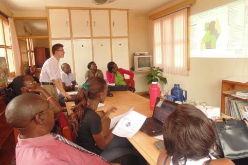 Daniel Chapman conducts a GIS training at Uganda Debt Network